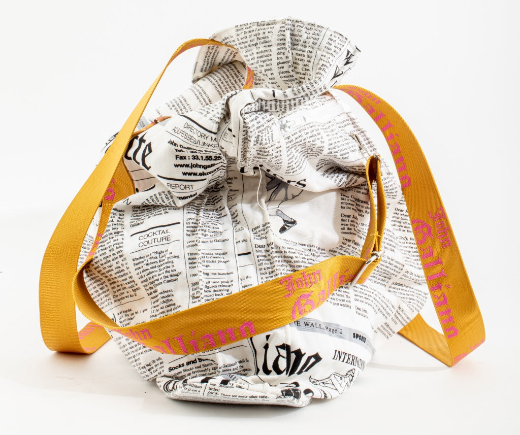 Sold at Auction: John Galliano Newsprint Pattern Backpack