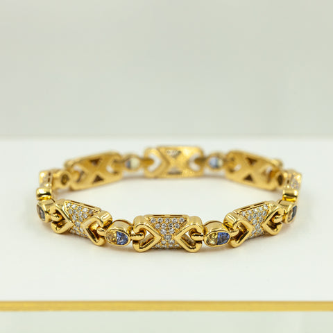 18K Gold Link Bracelet with Diamonds and Sapphires.