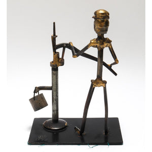 Brutalist Man Pumping Water Figural Sculpture in Metal back (6719976112285)