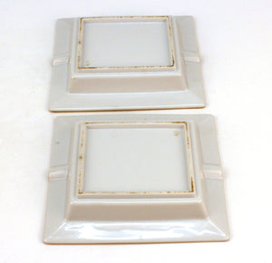 A set of two ceramic ashtrays with neoclassical motif with coat of arms (6719842353309)