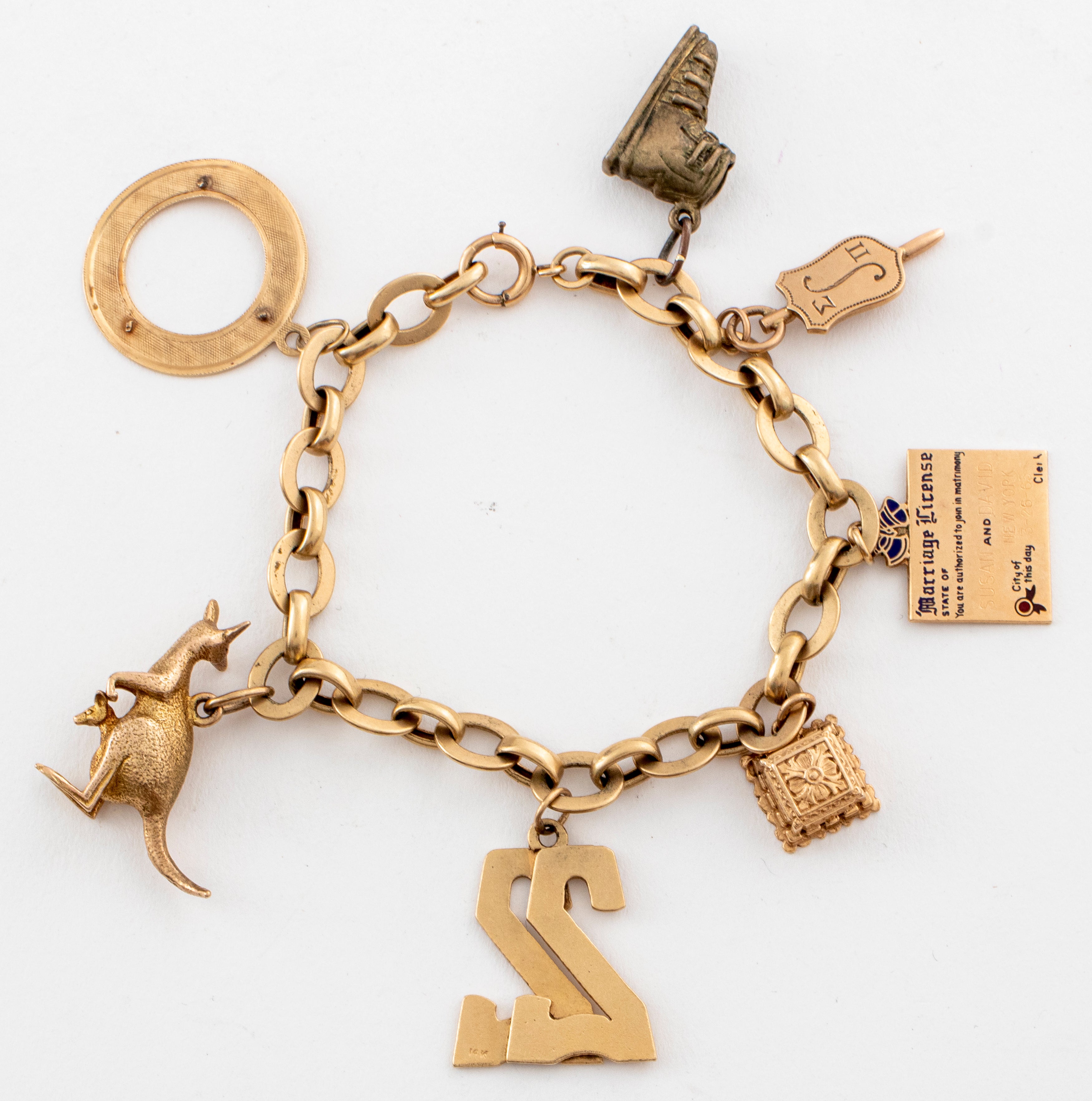14k Gold Vintage Charm Bracelet Doctor charms 7 1/4” Pearl & Coral 37 Grams